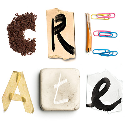 CREATE spelled out with objects like pencils and tape